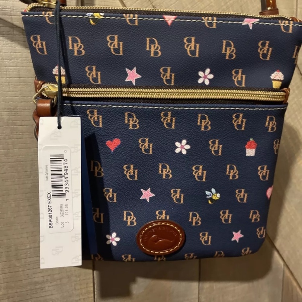 Beautiful Dooney & Bourke over the shoulder bag with adorable design.  No tags.
